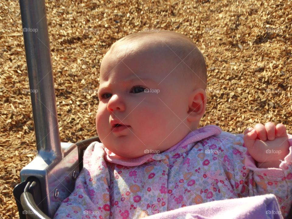 Baby On A Swingset