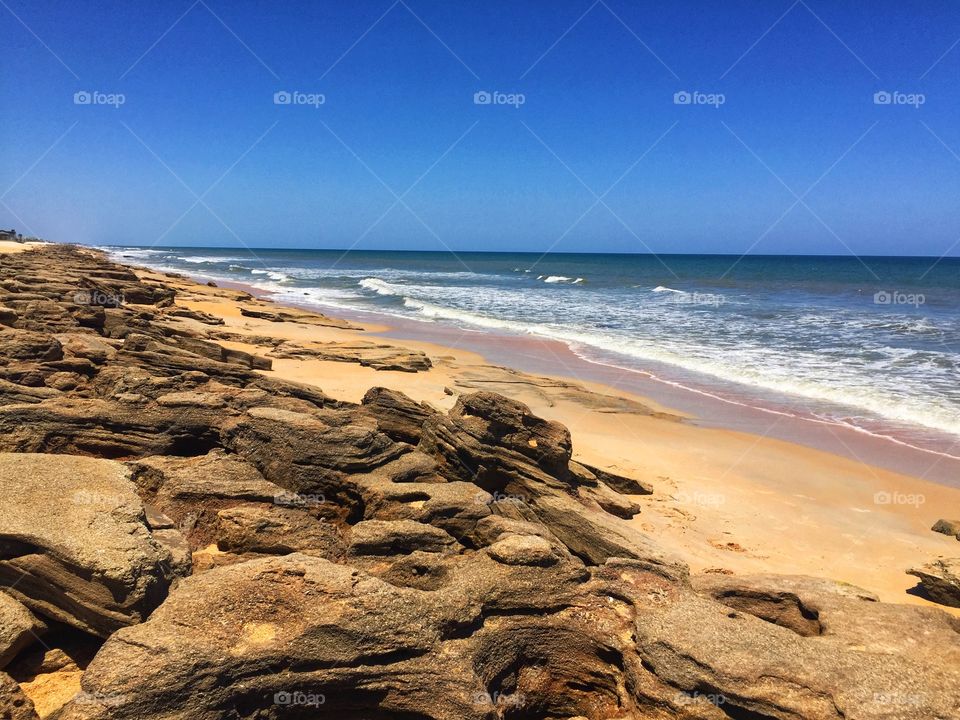 The beautiful coquina rock beach at Washington Oaks Gardens State Park in Palm Coast, Florida.