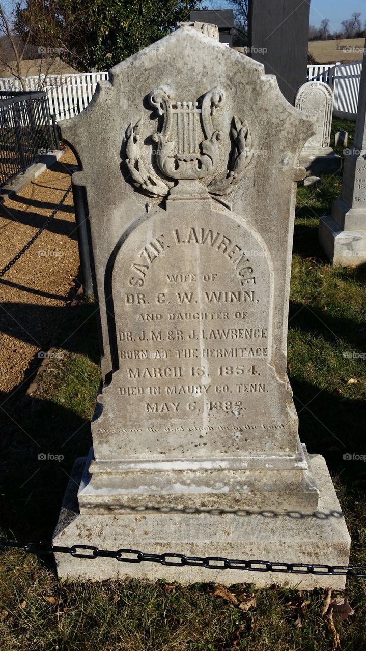 headstone with lyre