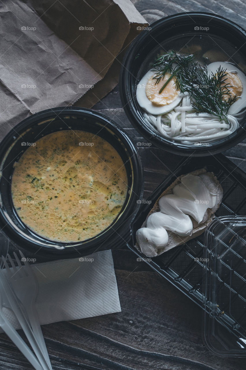 plates of soup and bread and butter