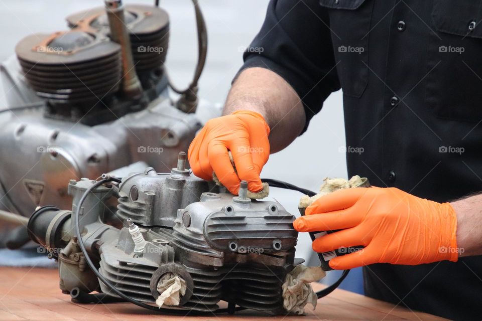 Mechanic working on engine