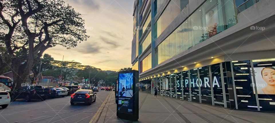 shoot during the golden hour peak of beautiful ❤️ sunset time with the cityscape view of modernized architecture.