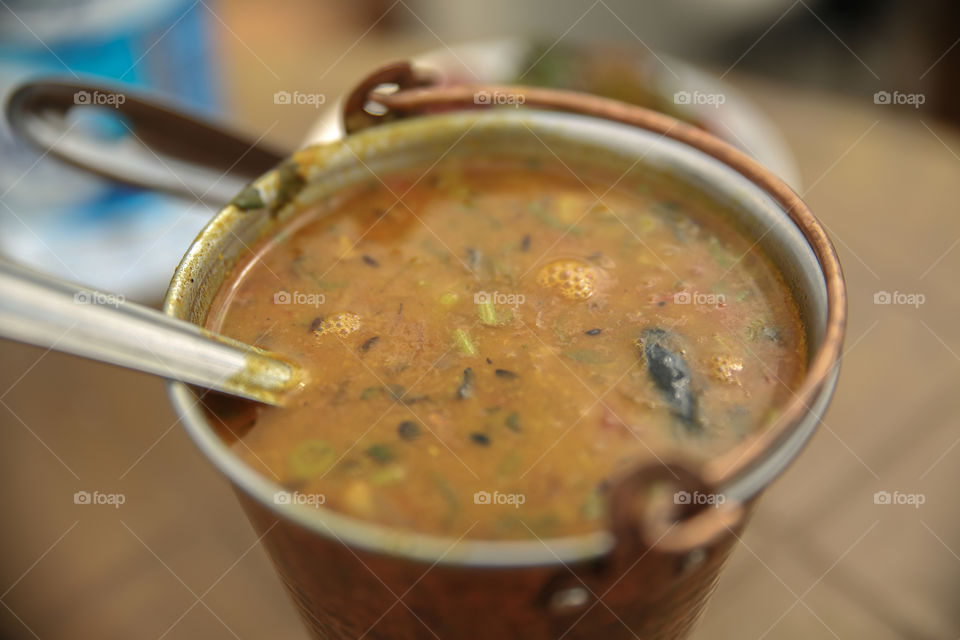 Dal fry in copper bucket
