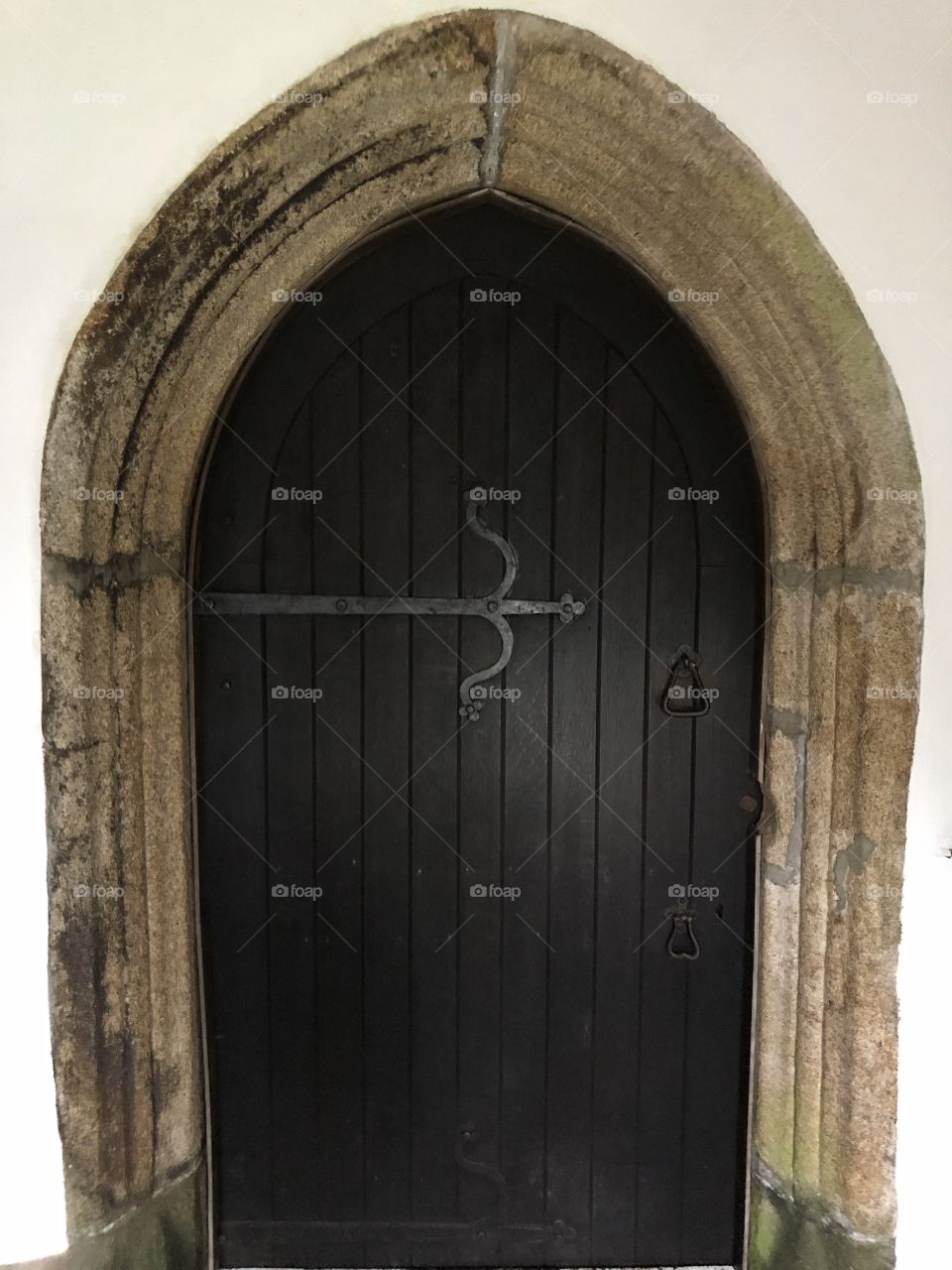 The entrance to Ilsington Church on Dartmoor In Devon, UK, presenting as elegant and purposeful.