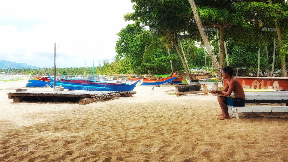local surfer in mati city, philippines