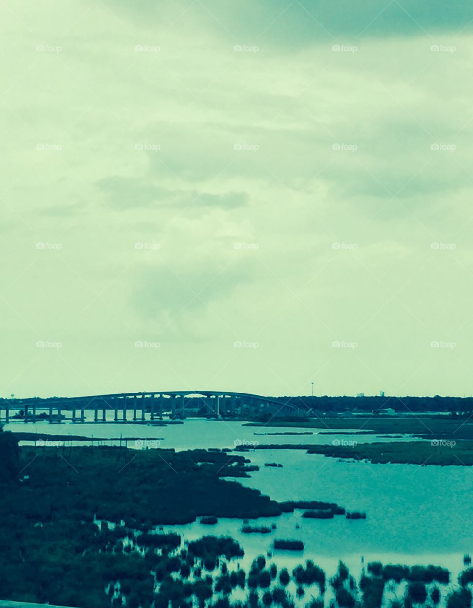 Water, bridge and little islands