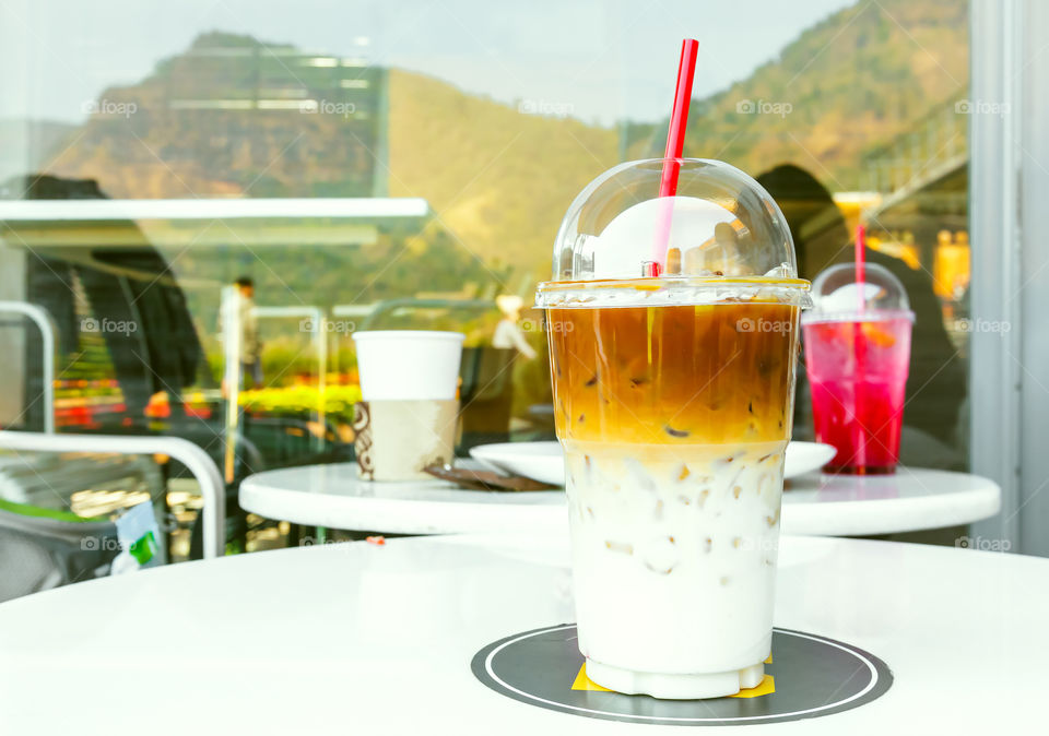 Ice coffee latte on mountain in Thailand 