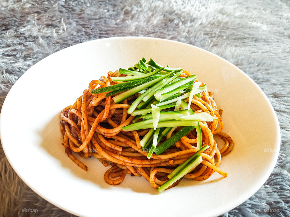 I made it by self. I'm traying new recipe. That is different pasta. I cooked with gochujang (Korean's chilli paste) and Indonesian curry. I never expected the taste will be good. It's really delicious and spicy.