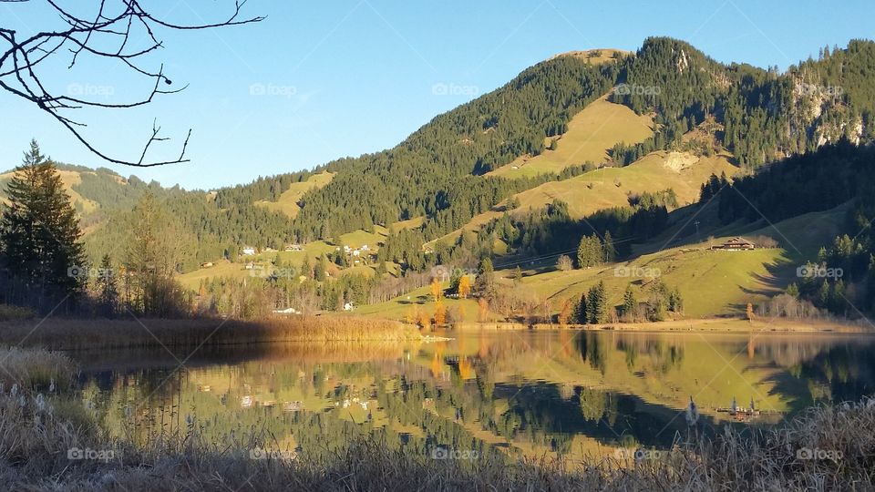 reflection on a lake in the swiss alps
