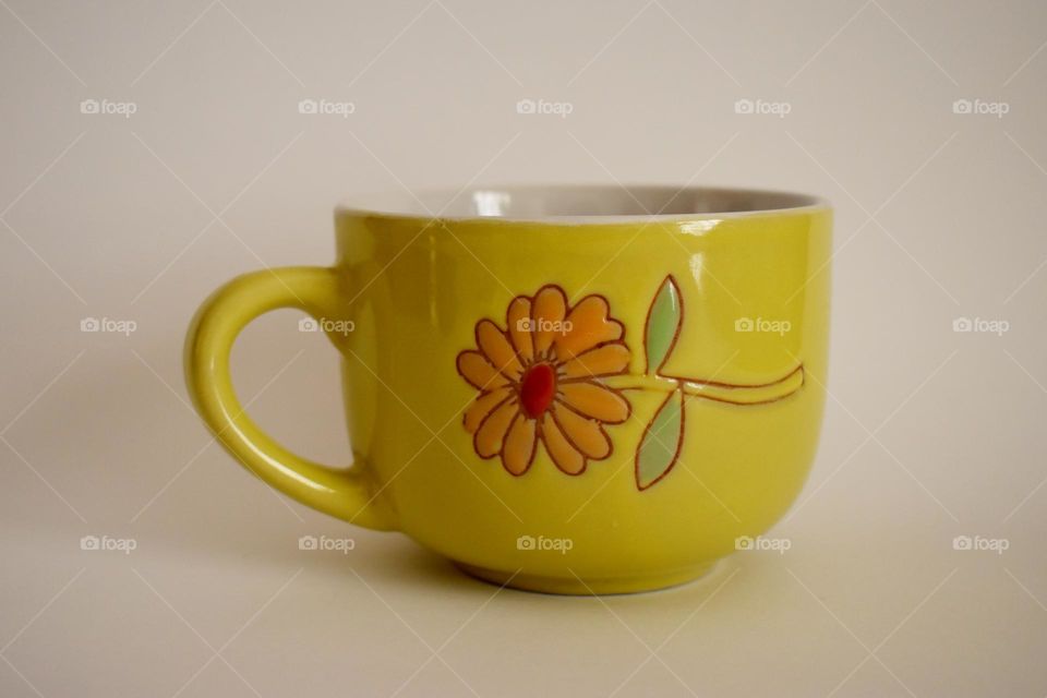 A cup in white background