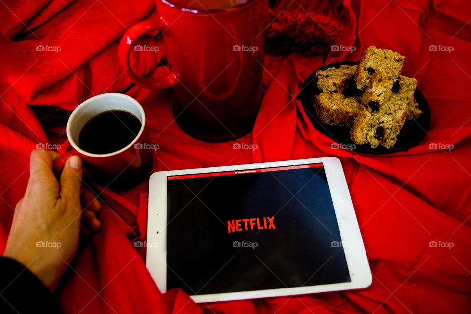 Netflix in winter warm and cosy with coffee and biscuits
