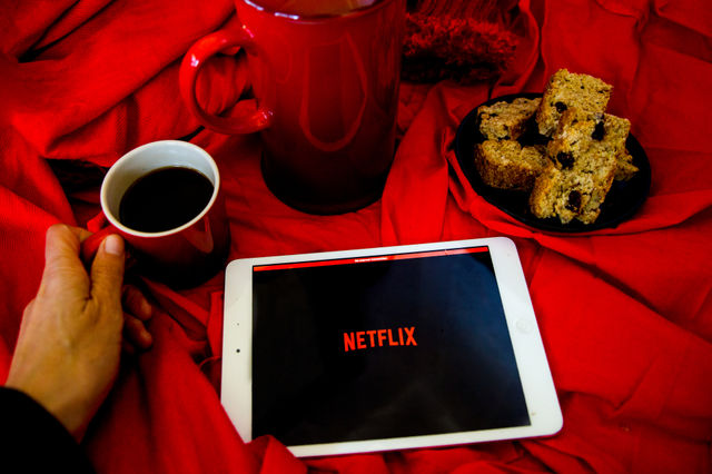 Netflix in winter warm and cosy with coffee and biscuits