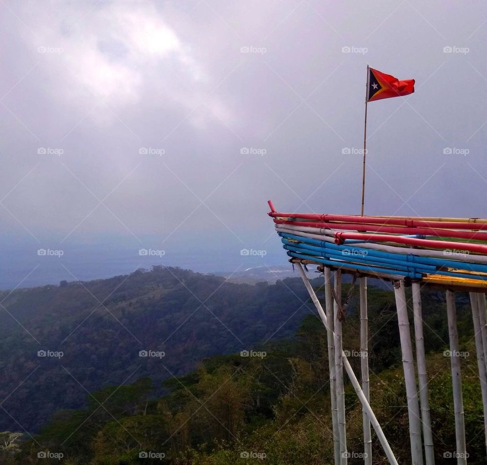 Timor-Leste flag at Mt Gugleur, highest point in Liquiçá , In a boat