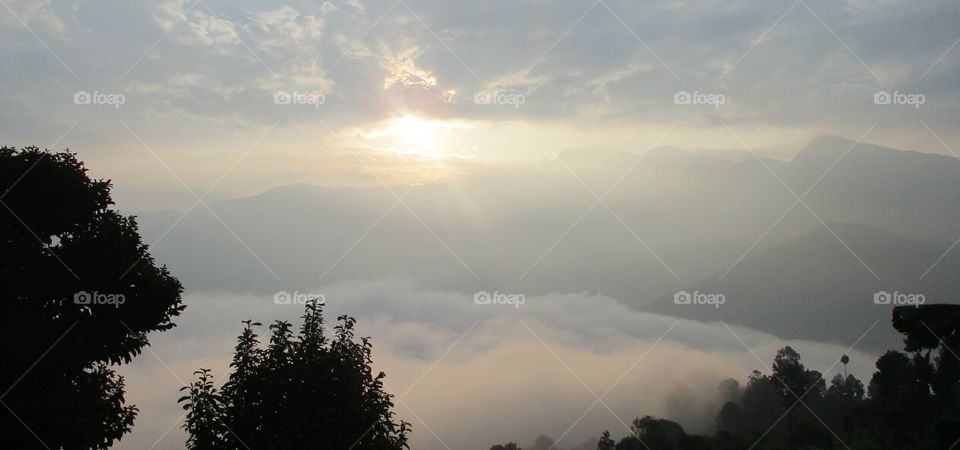 scenery of surroundings I the Sun rise with cloud covering the sun