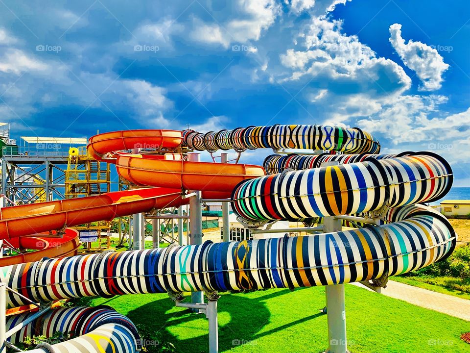 bright multi-colored water slides in the aquapark 