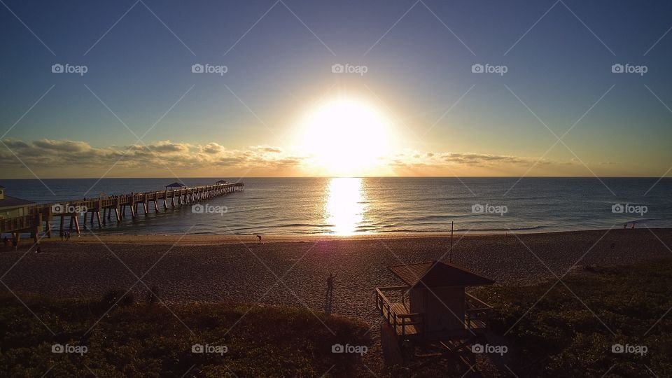 Ariel shot of the sunrise at Juno Beach, FL