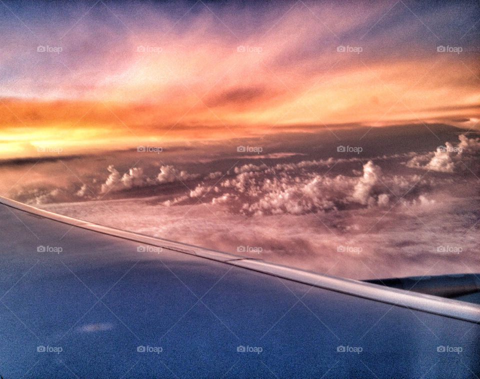 SUNSET DURING FLIGHT