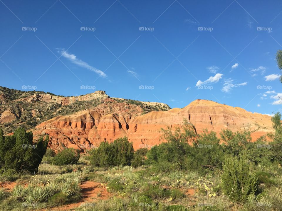 Beautiful Palo Duro canyon with vivid colors and a gorgeous bright sky 