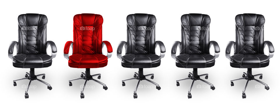 Unique concept. Four Black executive chairs with a red  one. Stand out concept