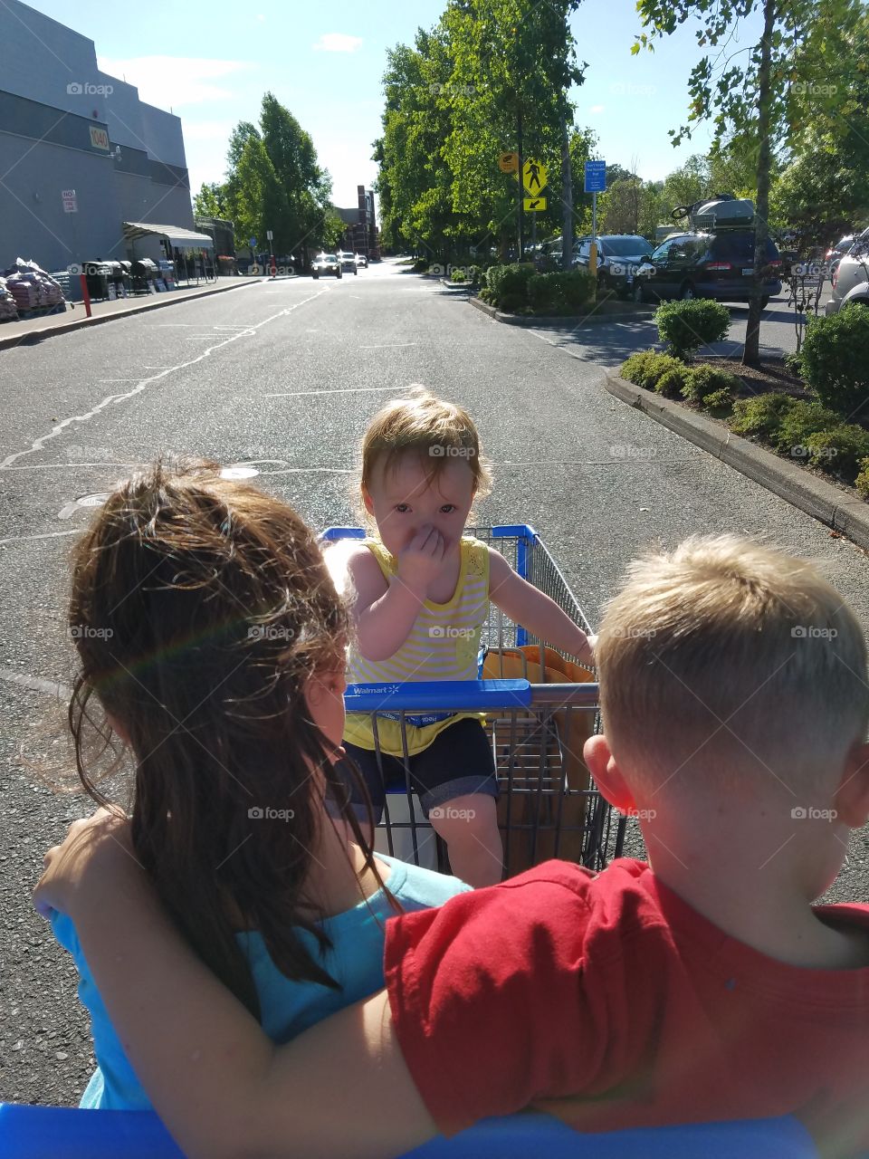 cousins rolling through Wal-Mart parking lot