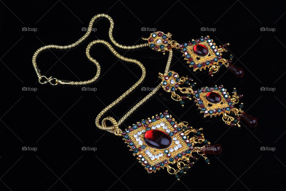 Indian jewelry set in black background