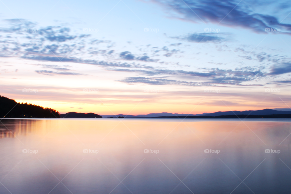 Long exposure sunset water beautiful sky clouds pretty