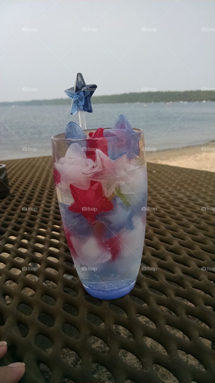 patriotic drink. enjoying independence day with a festive vodka & tonic
