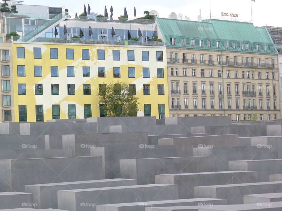 Holocaust Memorial in Berlin in shadow of hotels