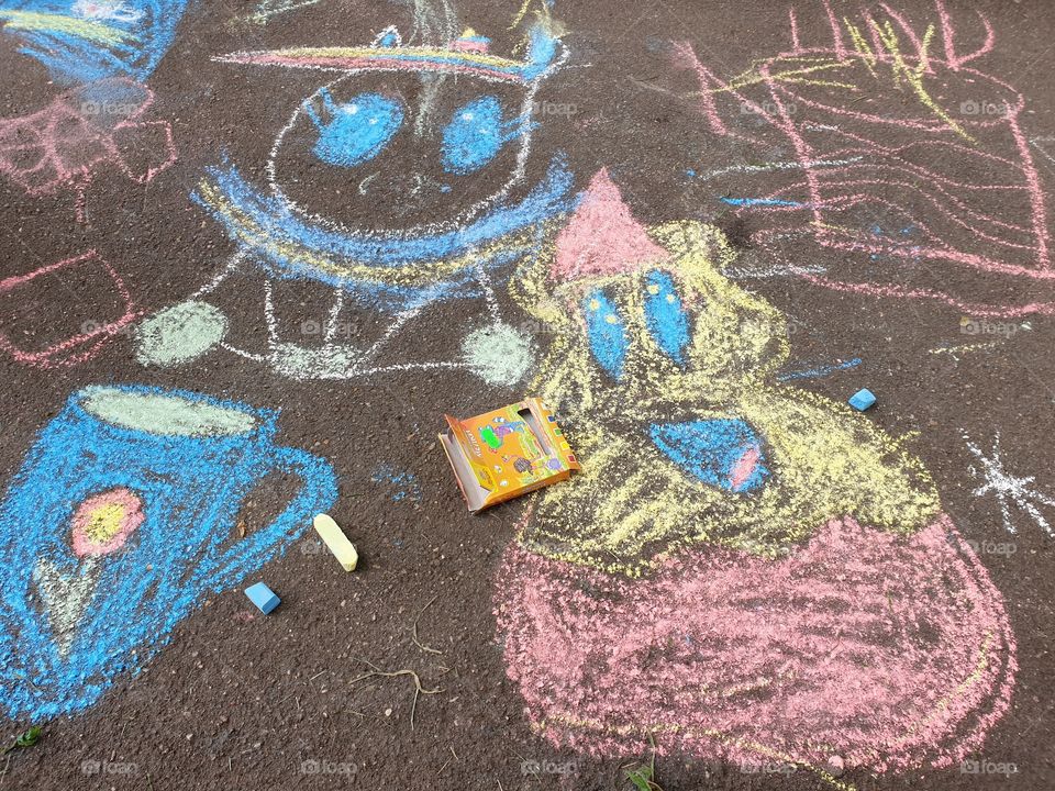 children's creativity.  instead of canvas, asphalt, instead of brushes and paints - colored chalk