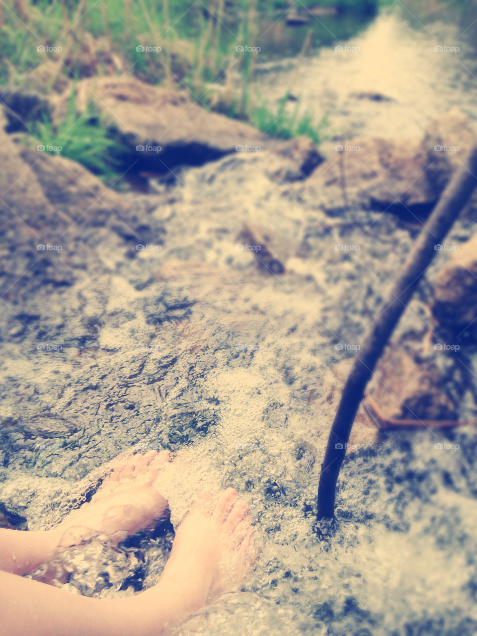 Creek feet. Me and my friends hand out at the creek by the river and we all stuck our toes in and I took a picture 