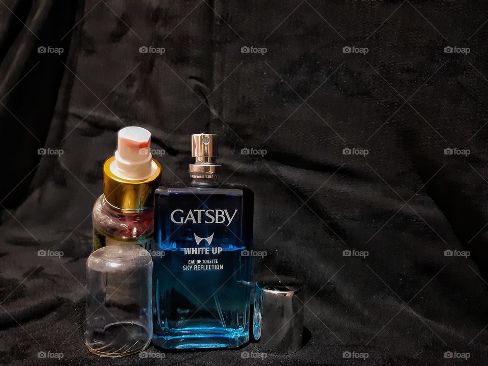 two perfume bottles from a brand named Gatsby.