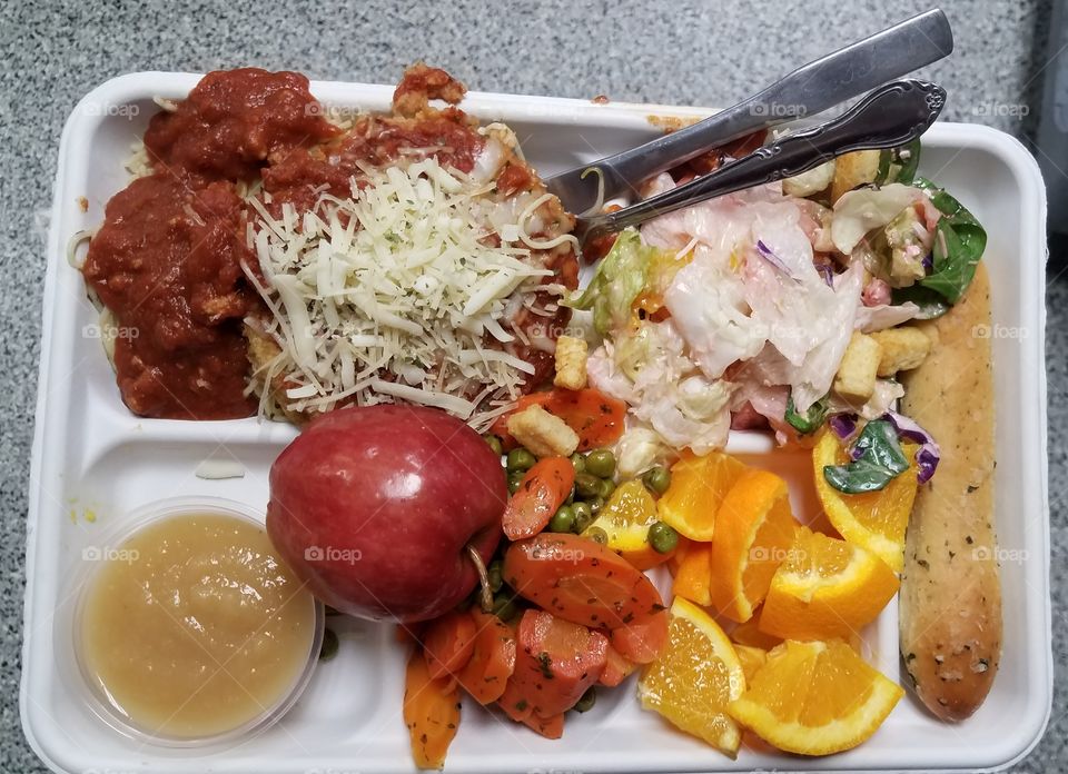 spaghetti and meatballs, with salad, fruit, and veggies