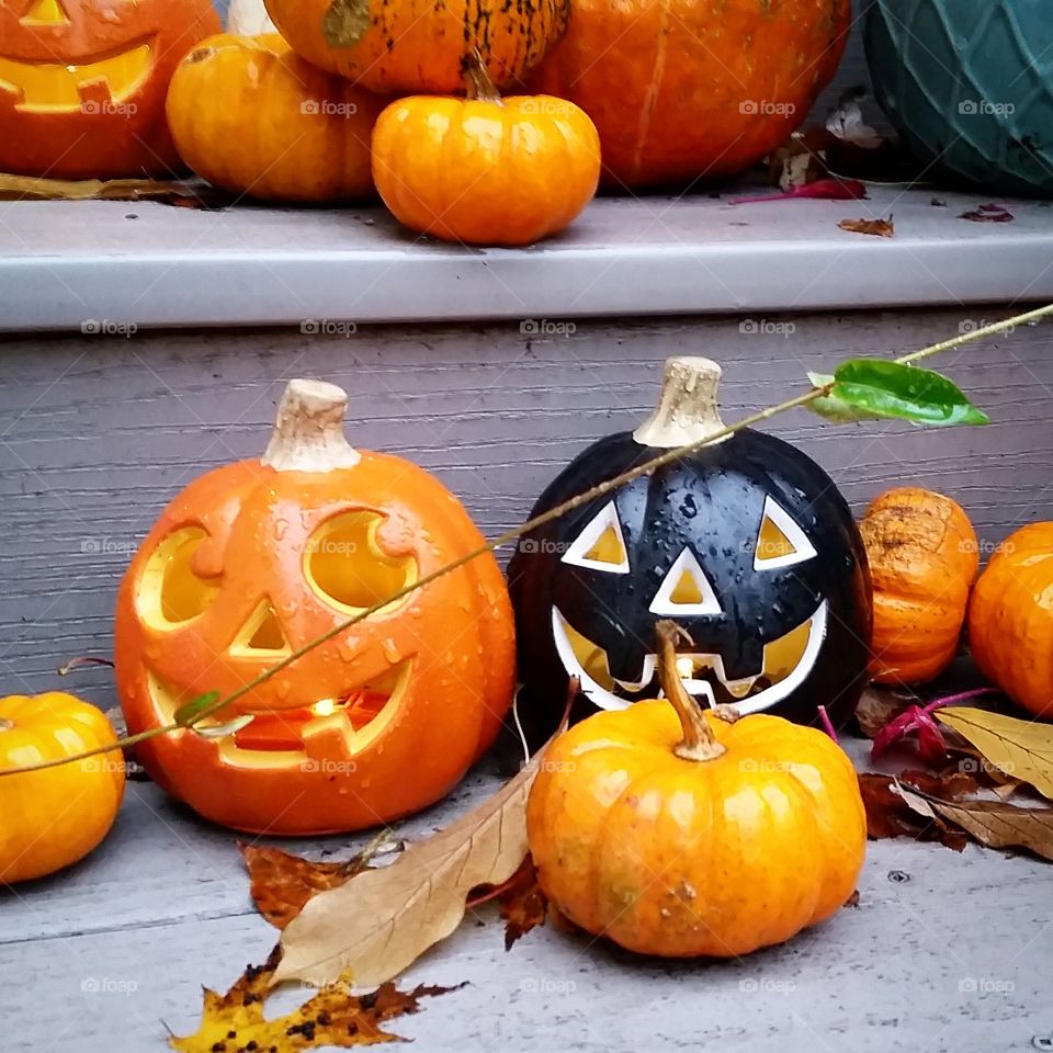 Jack-O-Lantern and small pumpkins