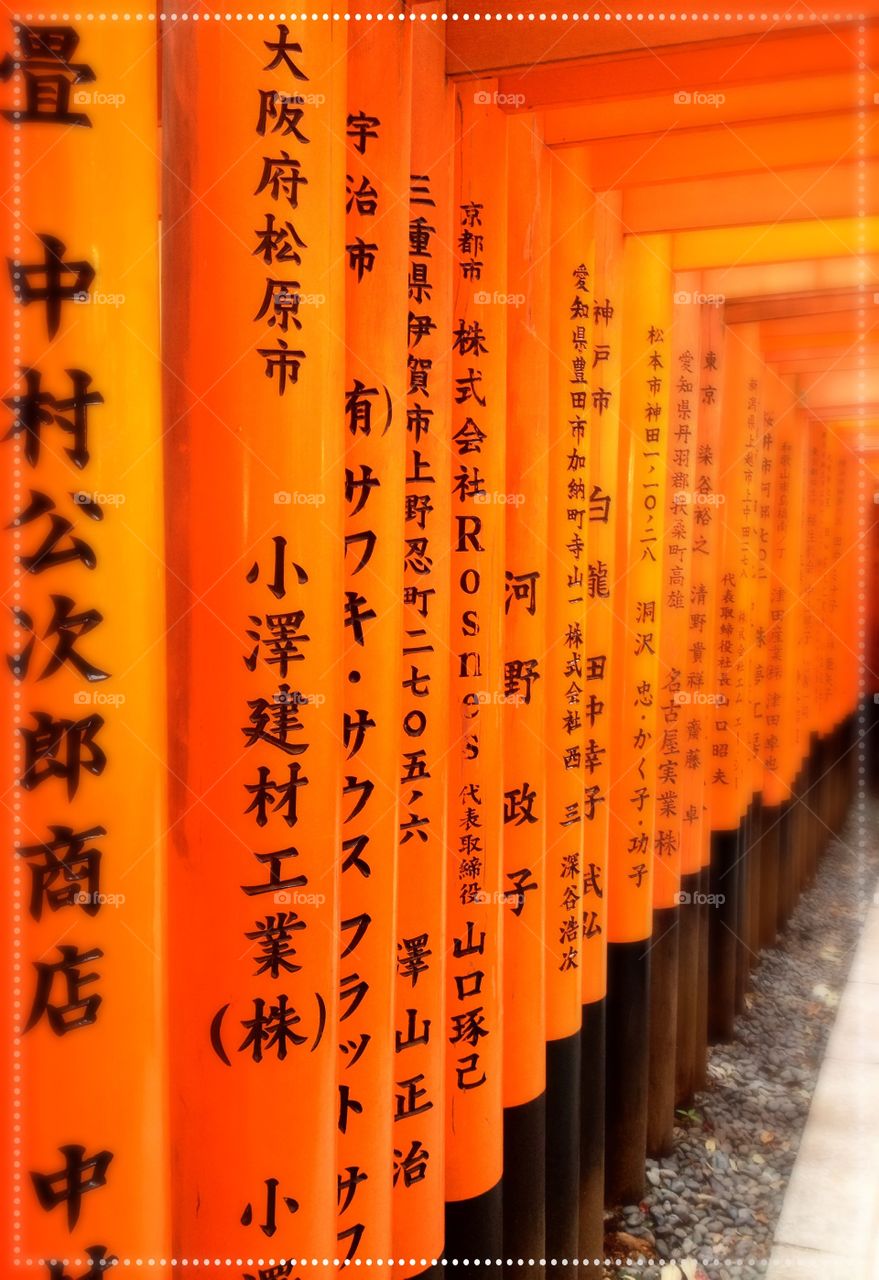 Fushimi Inami Shrine. Orange tunnel in Fushimi Inami temple is builded by wood.