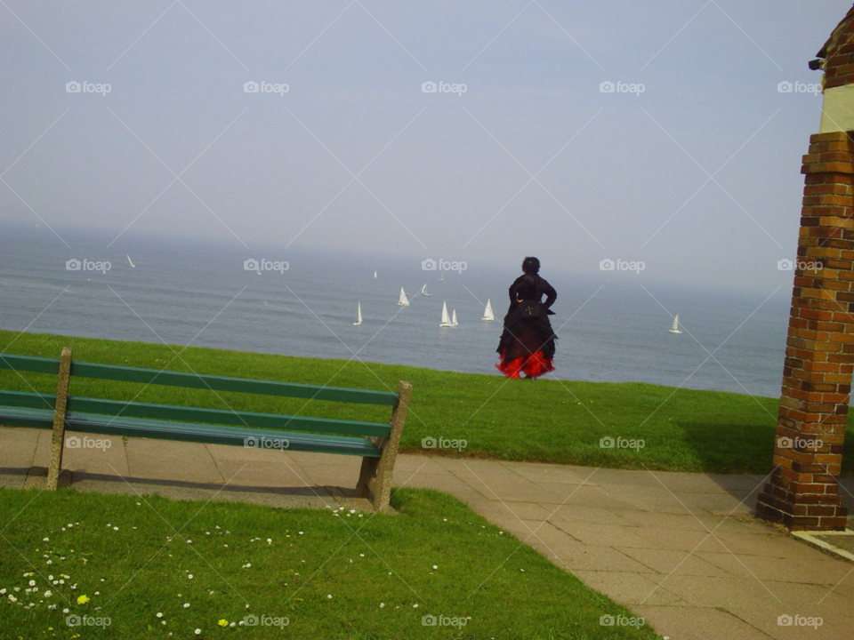 whitby north yorkshire re-enactment of fish wife looking to the sea for the fishing boats by pawright68