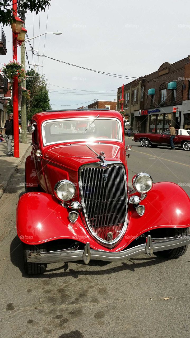 Vintage V8 Ford car on the street after an exposition