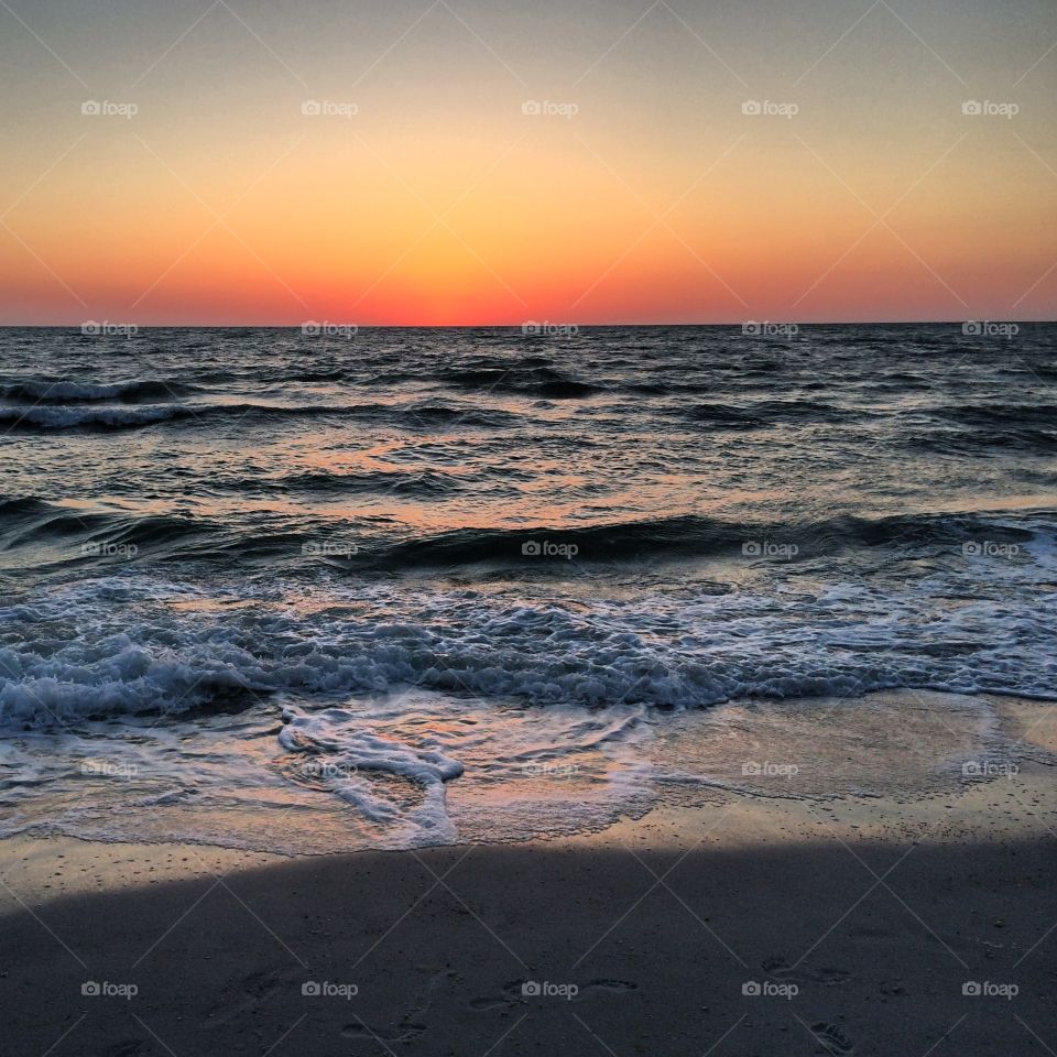 Naples Beach at sunset 
