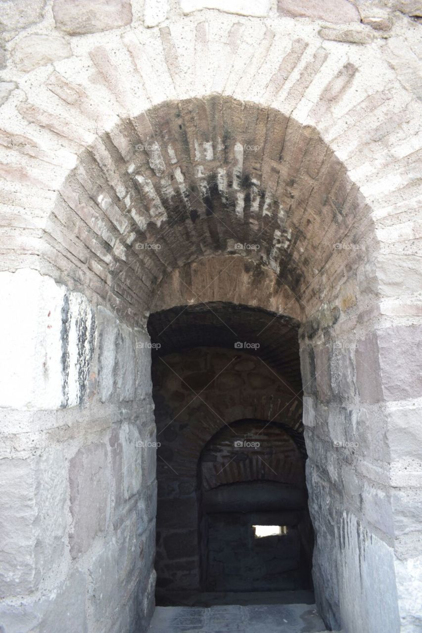 a doorway leading to many other doorways inside Ankara castle in Turkey