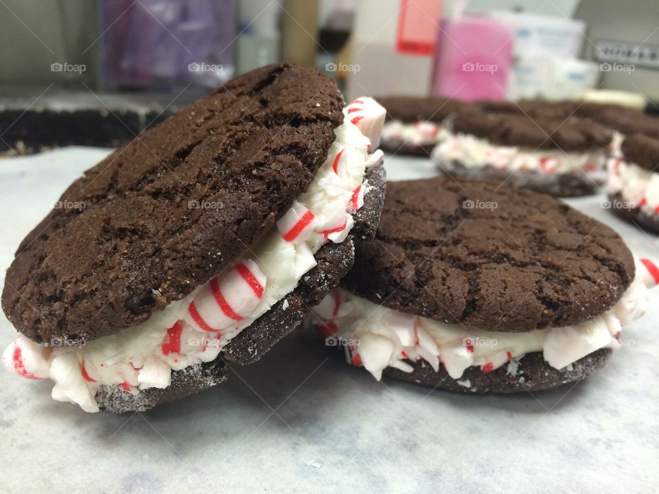Too cold for an ice cream sandwich? How about a cookie sandwich then! Chocolate cookies with vanilla filling rolled in crushed candy canes
