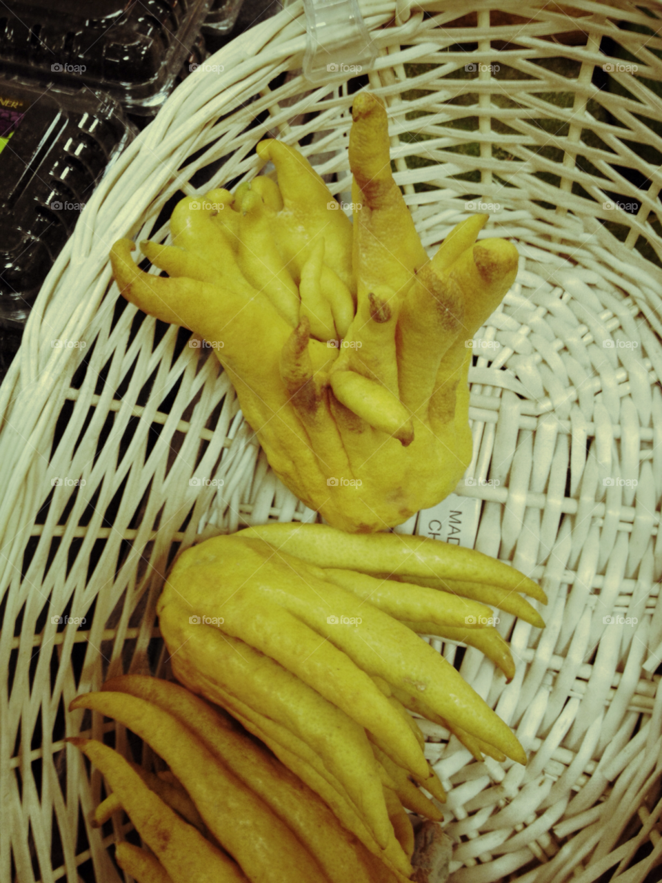 yellow fruit basket buddha hand by clevonian