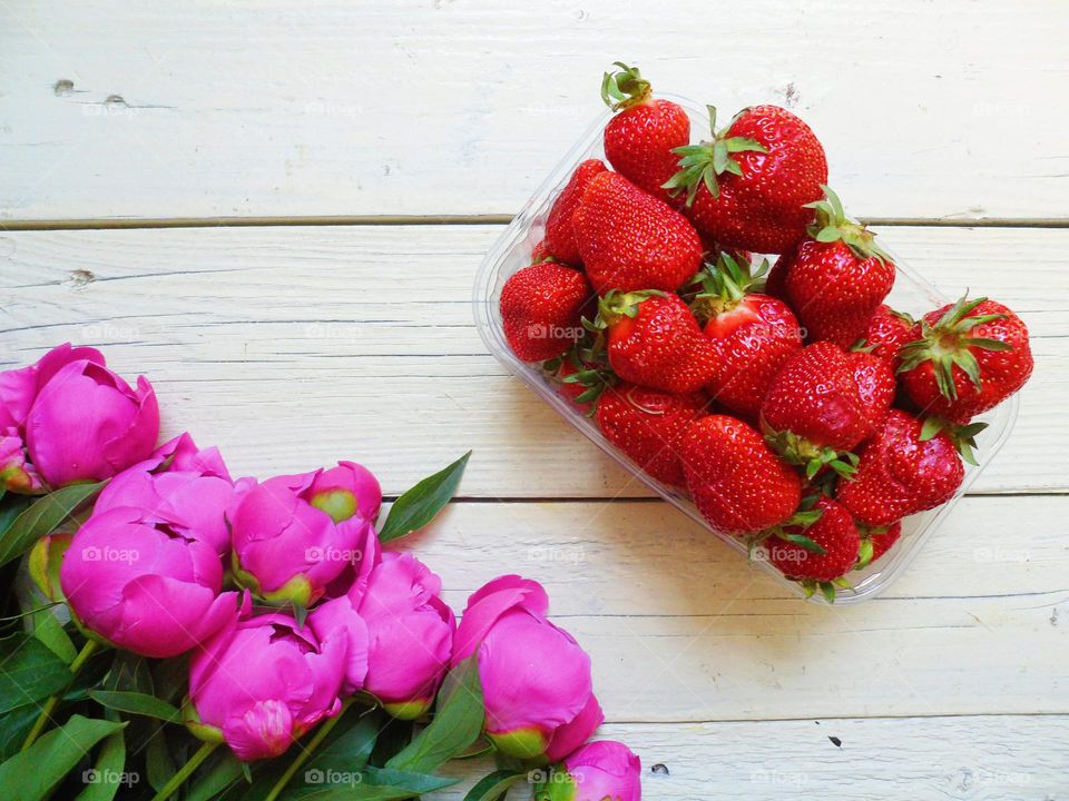 flowers peonies and strawberries