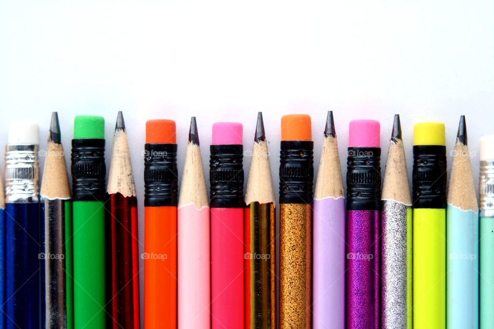 colorful pencils and erasers