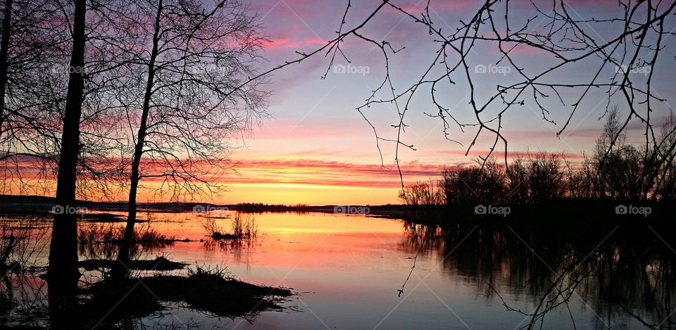 Sunset in the Northern Sweden . Fishing trip with beautifull sunset