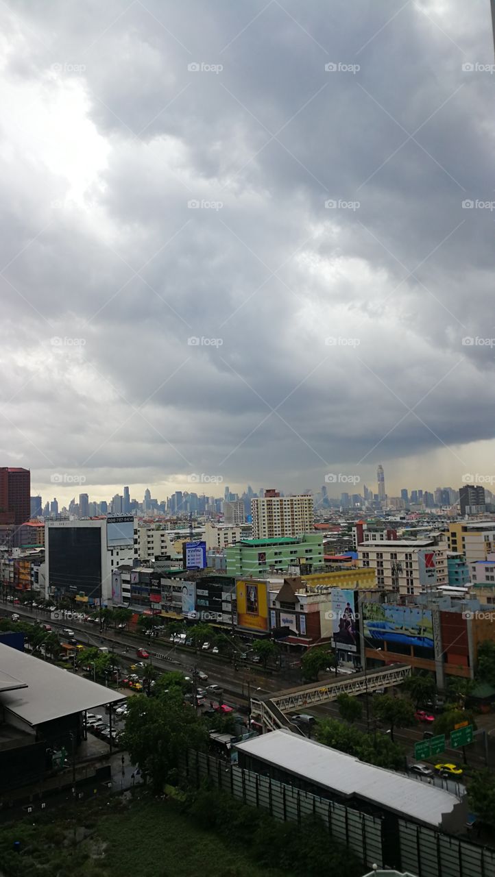 Storm clouds with Rain over Bangkok in Thailand.