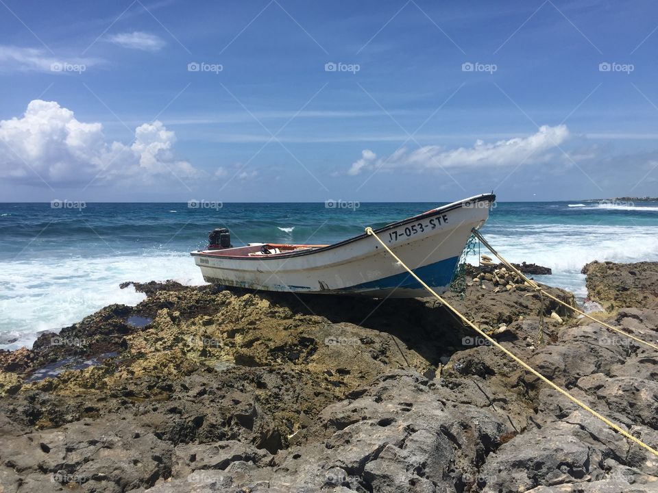 Boat on the rocks
