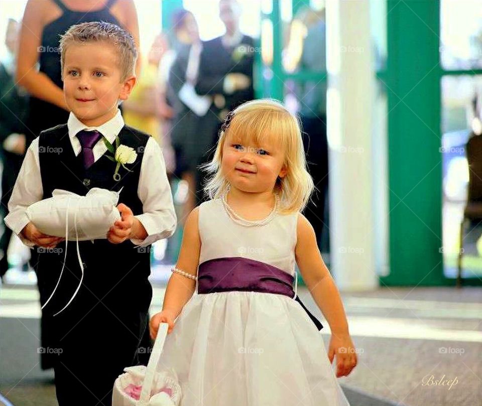 Portrait of ringbearer and flowergirl at wedding