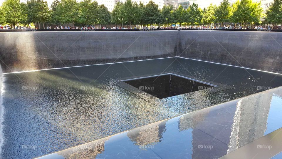 I took this photo at the World Trade Center Memorial Fountains in New York City!