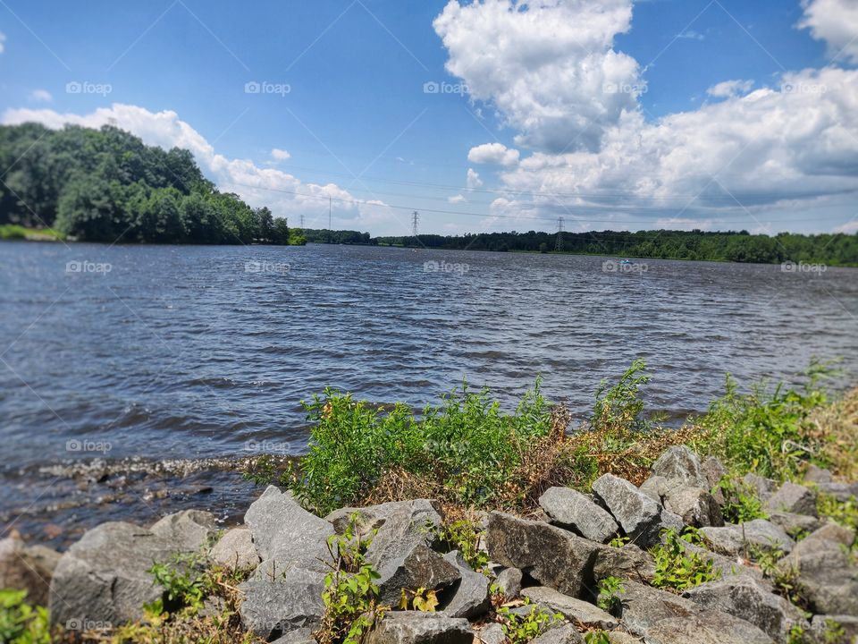 Beautiful River 
with beautiful view in between nice green forest and blue sky