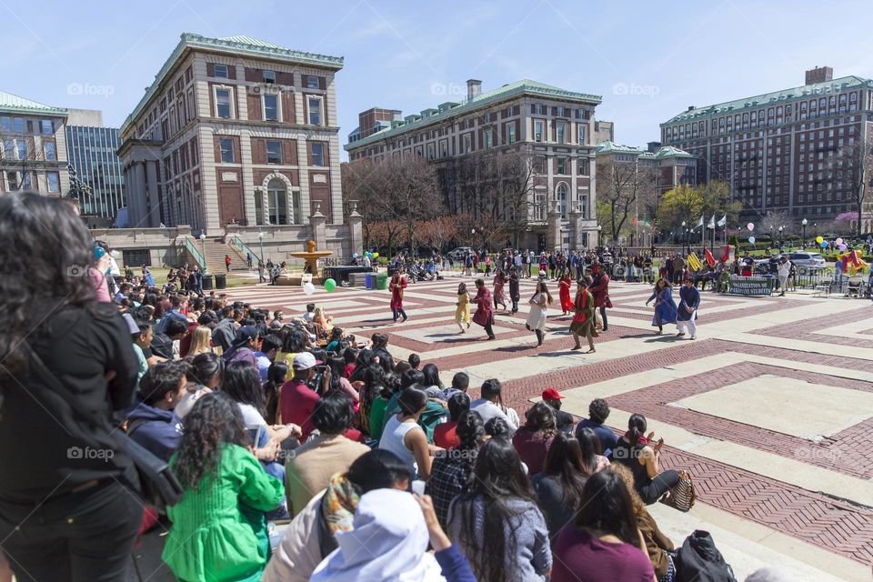 Crowd watching cultural students' performance at university ground in New York