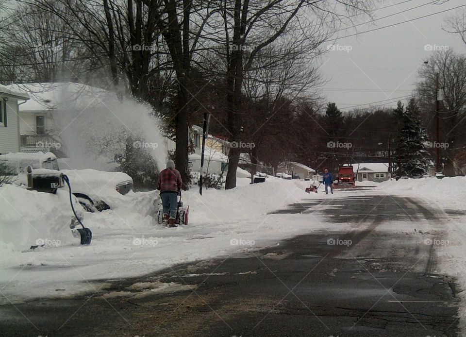 blowing the snow